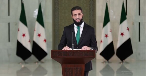 Ahmad Al-Shar' speaks after his appointment as President
